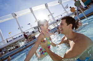 Disney Cruise Line Disney Dream Exterior Father and child in pool.jpg